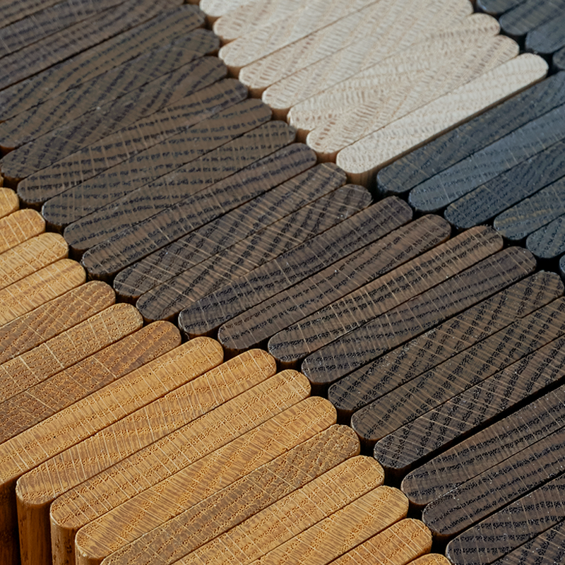 Patterned wood samples in honey, acorn brown, white natural, and dark smoked finishes.